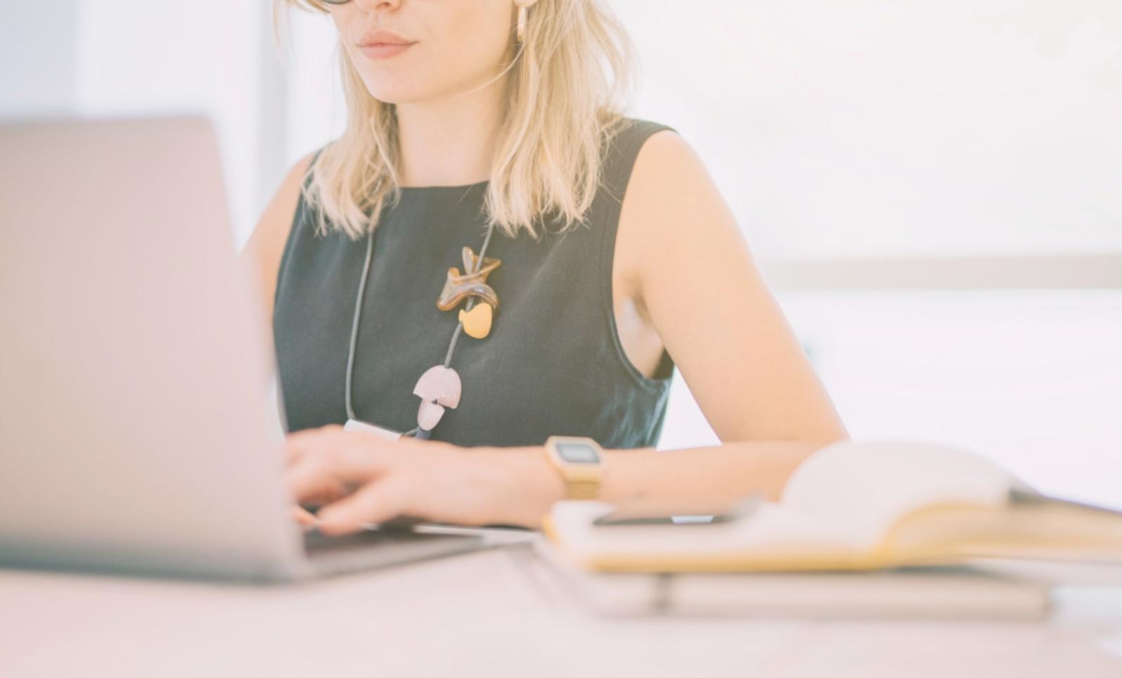 Workshop materials and budget planning tools on desk